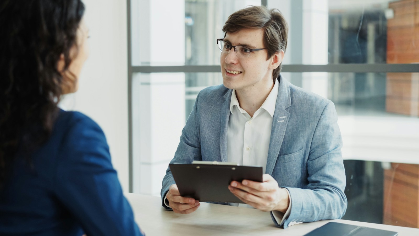 Employer discussing a job offer with a candidate