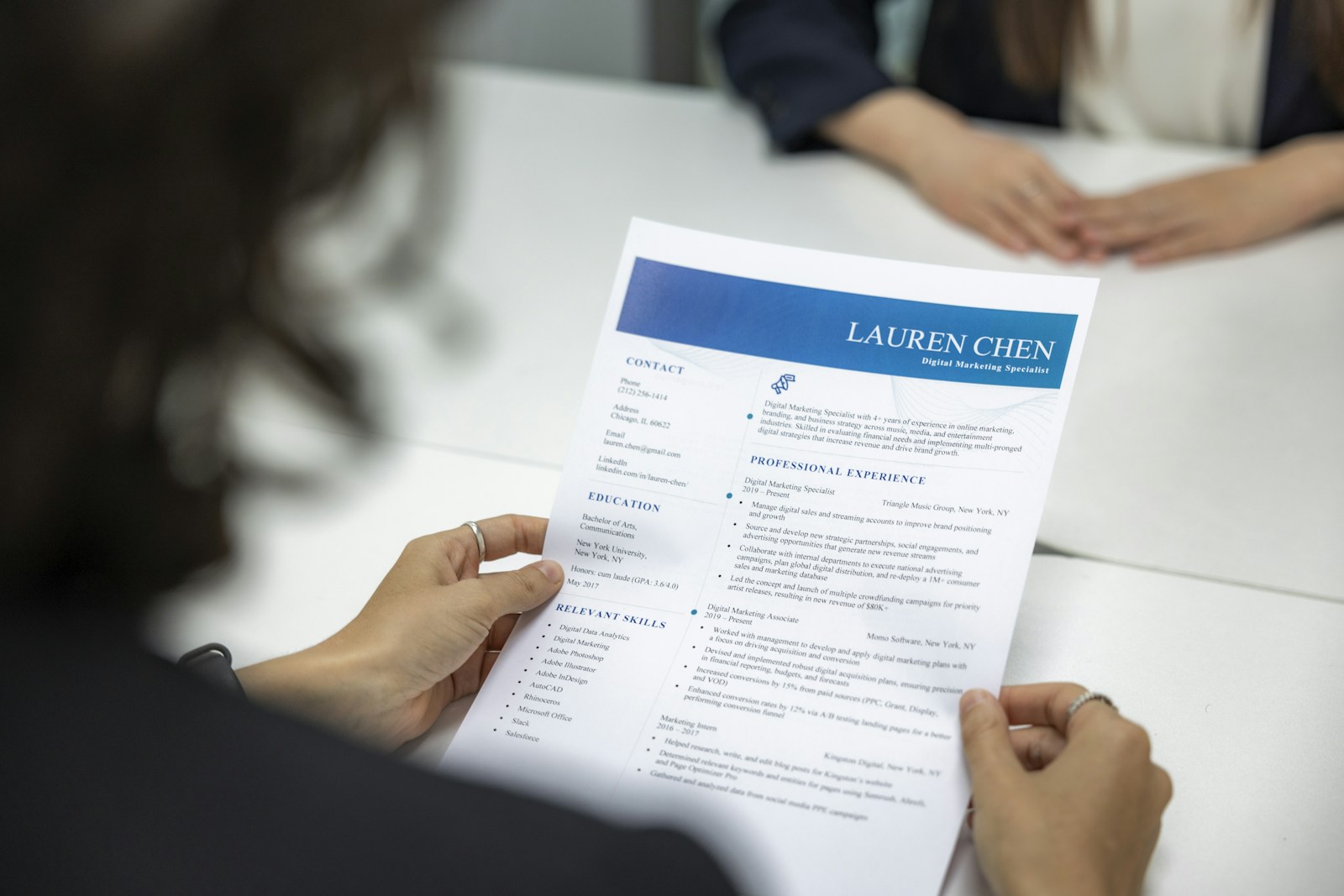 Resume being reviewed during a hiring conversation