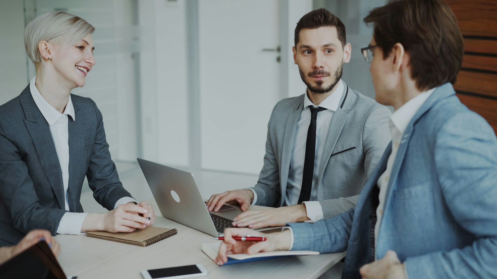 Senior professionals in a strategy meeting